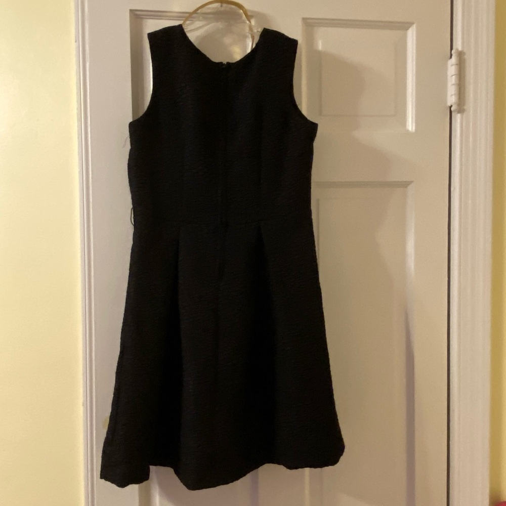 Black sleeveless KC Parker  dress with gold belt. Size 12